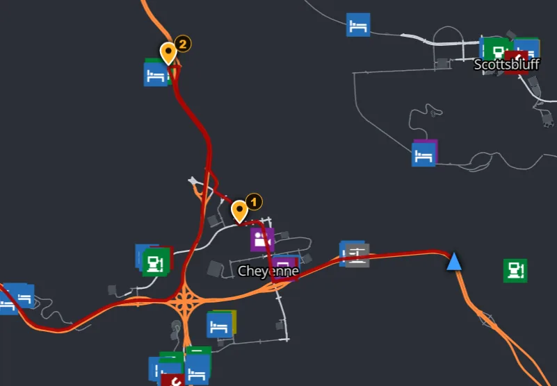 Route through two numbered waypoints near Cheyenne with fuel and rest stops on the map